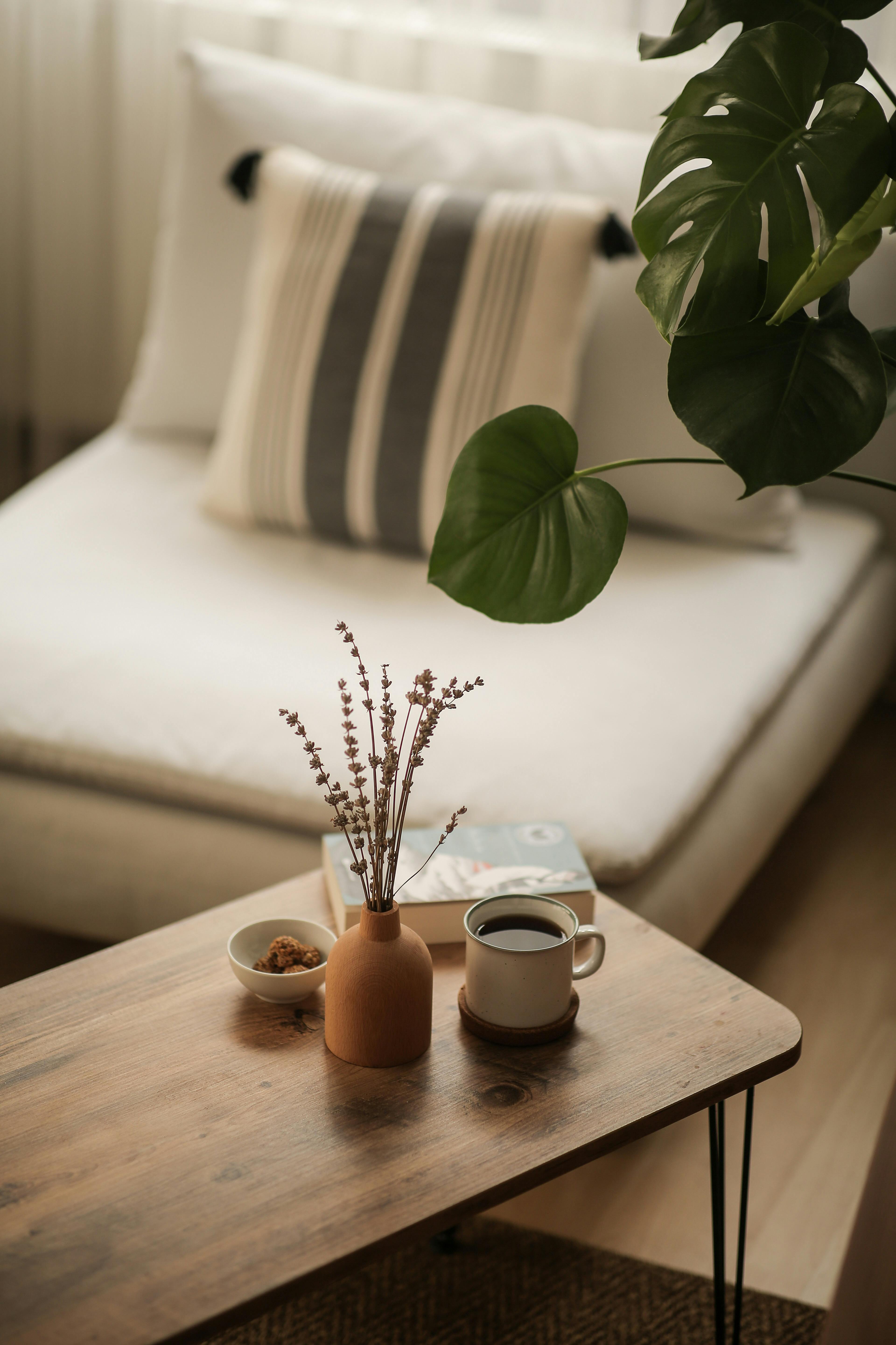 handcrafted ceramic coffee cup on wooden table in a calm living space
